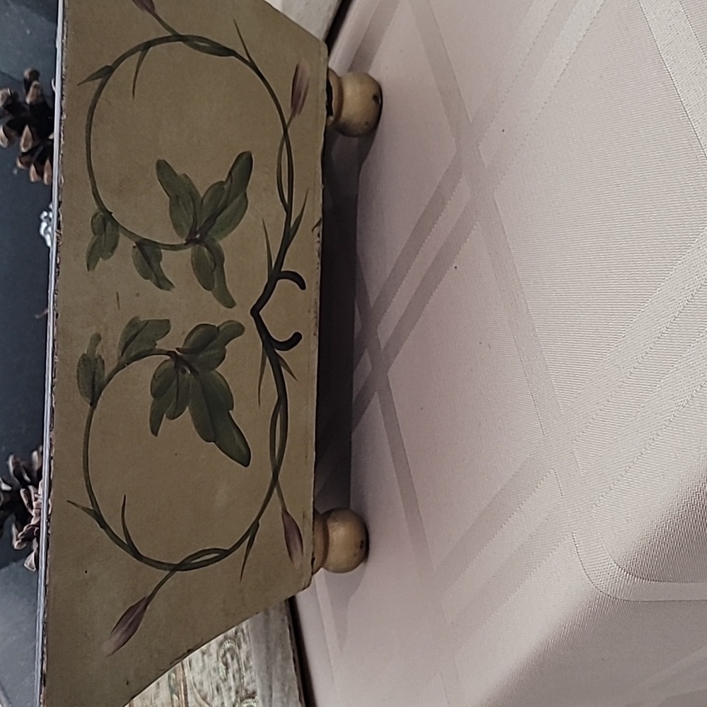 Decorative wooden square bowl.